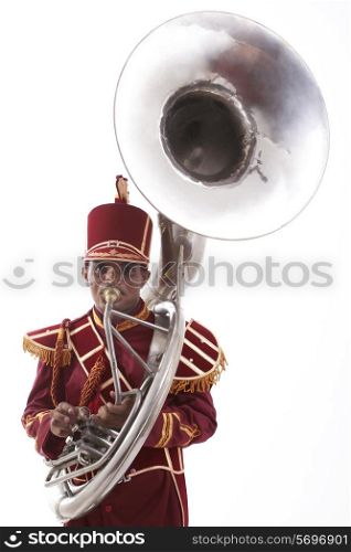 Portrait of a bandmaster playing a sousaphone