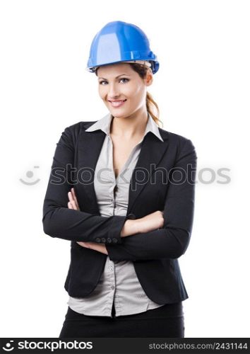 Portrait of a beautiful and young female architect with a blue helmet