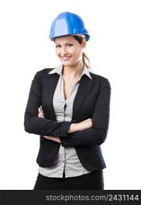 Portrait of a beautiful and young female architect with a blue helmet