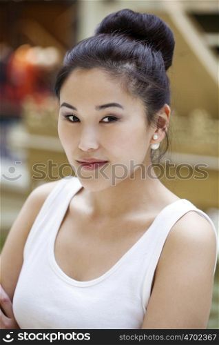 Portrait of a beautiful asian young woman in the store