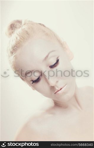 Portrait of a beautiful ballet dancer with silvery makeup
