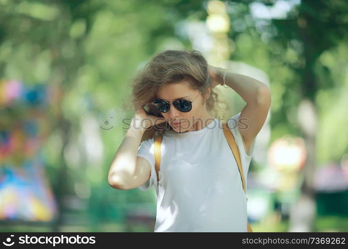 portrait of a beautiful blonde in sunglasses