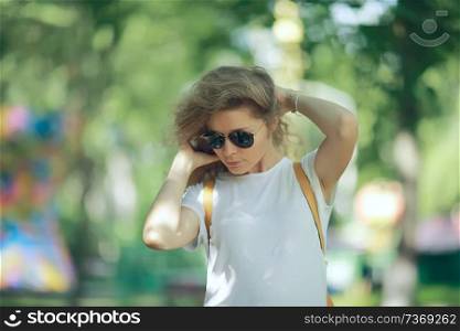 portrait of a beautiful blonde in sunglasses