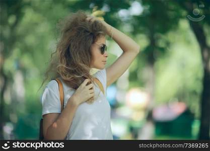 portrait of a beautiful blonde in sunglasses