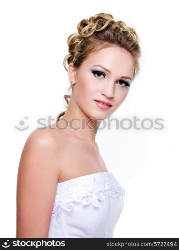 Portrait of a beautiful bride with fashion wedding hairstyle - isolated on white