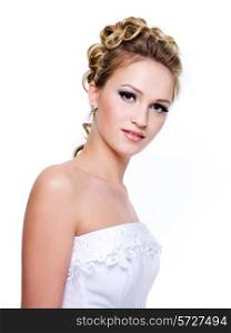 Portrait of a beautiful bride with fashion wedding hairstyle - isolated on white