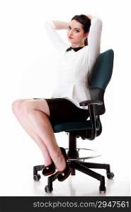 Portrait of a beautiful brunette young business woman sitting on chair white background