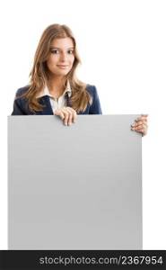 Portrait of a beautiful business woman holding a blank billboard