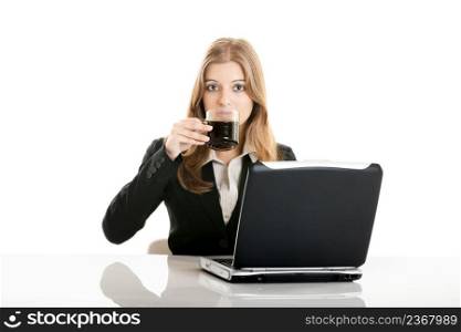 Portrait of a beautiful business woman in the office drinking a coffee