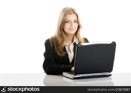 Portrait of a beautiful business woman working at her desk with a laptop