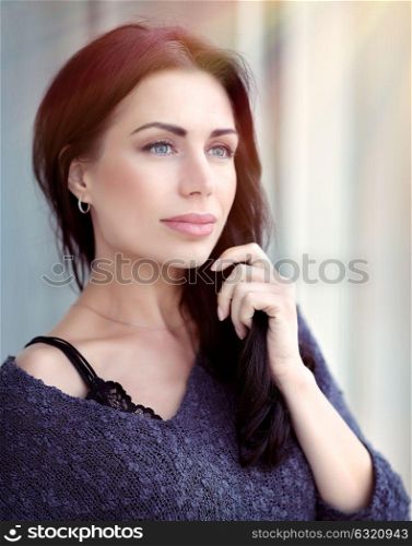 Portrait of a beautiful calm brunet woman outdoors in sunny day, gorgeous female with perfect authentic appearance, natural beauty