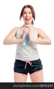 portrait of a beautiful cheerful girl on a white background with a water bottle
