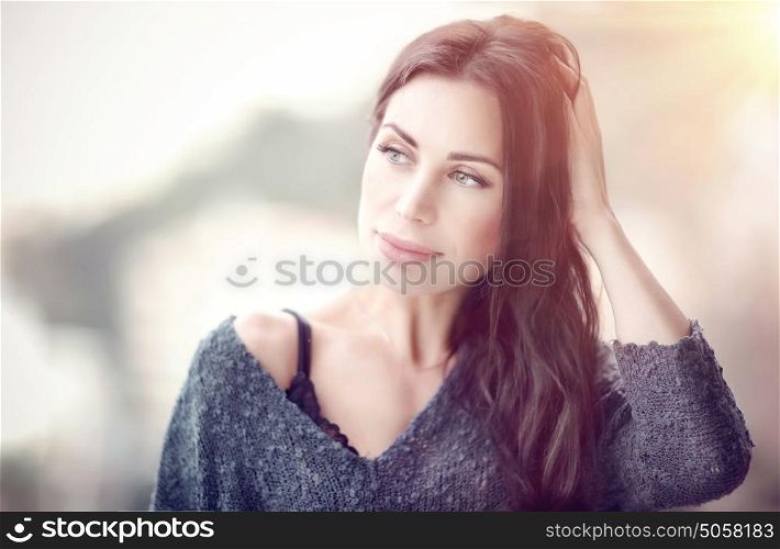 Portrait of a beautiful gentle woman in the morning, calm sensual female outdoors, having a good beginning of a nice day