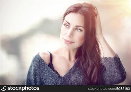 Portrait of a beautiful gentle woman in the morning, calm sensual female outdoors, having a good beginning of a nice day