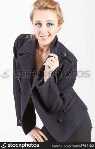 Portrait of a beautiful girl in a black suit