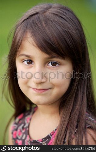 Portrait of a beautiful girl in the garden -focus in the eye-