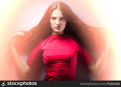 Portrait of a beautiful girl with flying hair