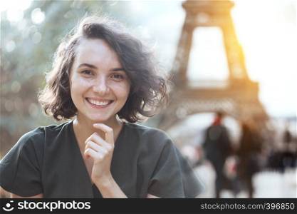 portrait of a beautiful happy smiling girl at the outdoor. Fun and summer