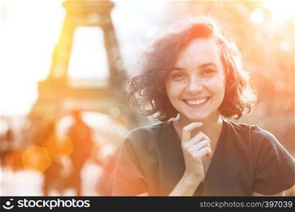 portrait of a beautiful happy smiling girl at the outdoor. Fun and summer