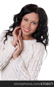 portrait of a beautiful happy woman in a knitted jacket