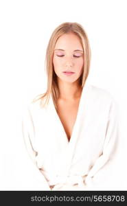 Portrait of a beautiful healthy young blonde woman in a white spa bath robe