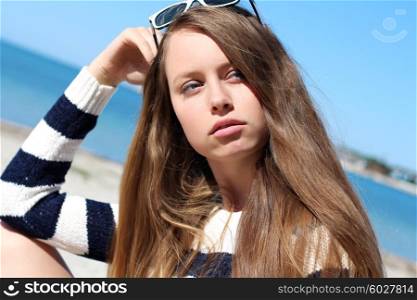 portrait of a beautiful hipster girl in glasses close up. woman on vacation.