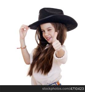 Portrait of a beautiful little girl in a black cowboy hat, studio on white isolated background