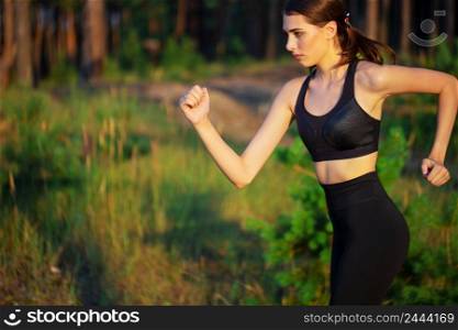 Portrait of a beautiful running girl in the forest. Portrait of beautiful running girl in forest