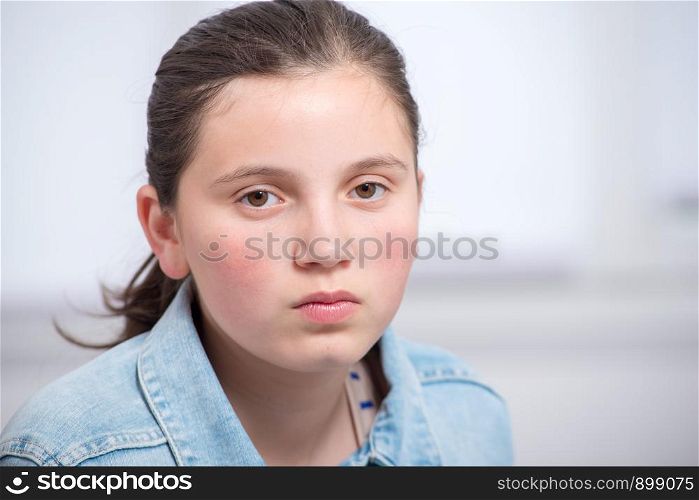 portrait of a beautiful sad teenager girl