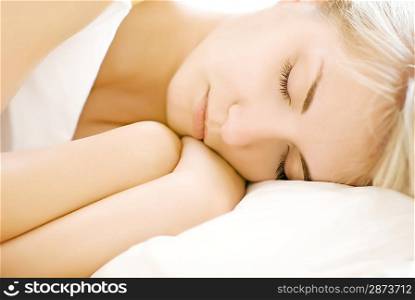 Portrait of a beautiful sleeping woman (shallow DoF, focus on eyes)