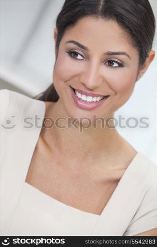 Portrait of a beautiful smart young Latina Hispanic woman or businesswoman smiling