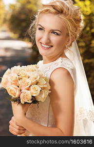 Portrait of a beautiful smiling happy bride. Wedding concept