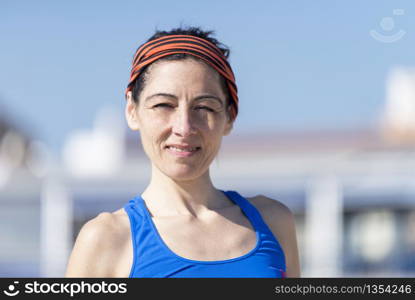 Portrait of a beautiful sporty woman before run