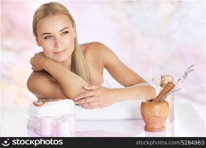 Portrait of a beautiful woman at spa salon, nice girl enjoying time in the wellness hotel, beauty treatment, healthy lifestyle concept