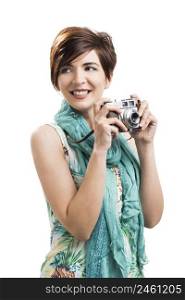 Portrait of a beautiful woman holding a vintage camera, isolated over a white background