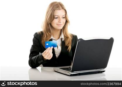 Portrait of a beautiful woman shopping online using a credit card