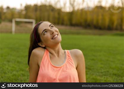 Portrait of a beautiful woman smiling and thinking