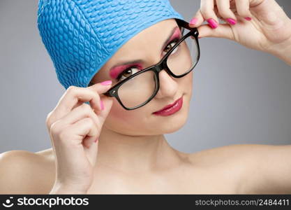 Portrait of a beautiful woman wearing a swim cap