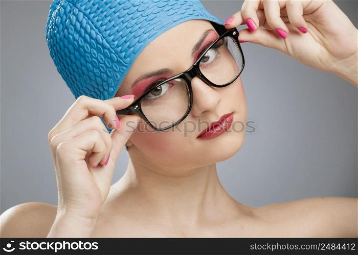 Portrait of a beautiful woman wearing a swim cap