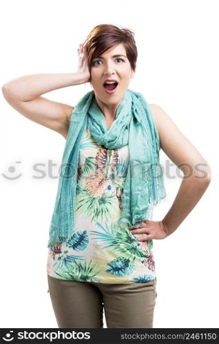 Portrait of a beautiful woman with a confused expression, isolated over a white background