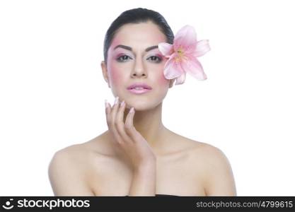 Portrait of a beautiful woman with flower
