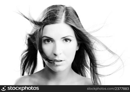 Portrait of a beautiful woman with hair blowing - toned in PS