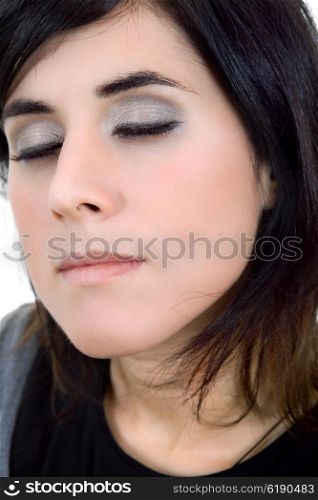 portrait of a beautiful woman with her eyes closed