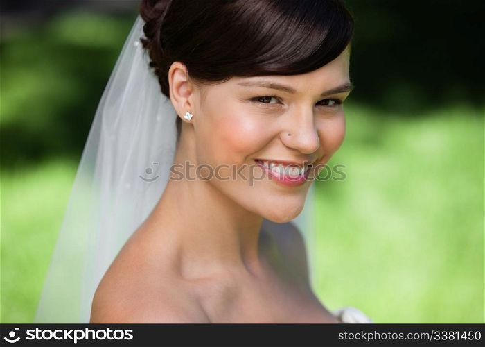 Portrait of a beautiful young bride smiling