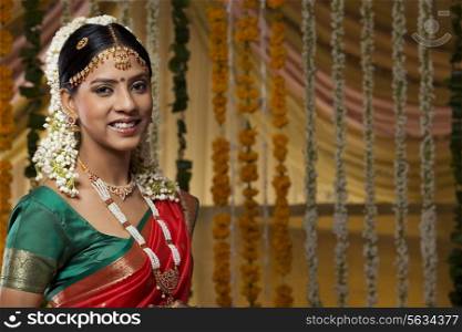 Portrait of a beautiful young bride smiling