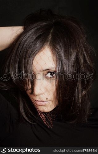 Portrait of a beautiful young brunette woman