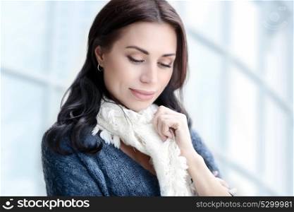 Portrait of a beautiful young business woman over office building background, natural beauty of a confident stylish female