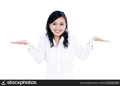 Portrait of a beautiful young businesswoman with her arms outstretched, presenting things.