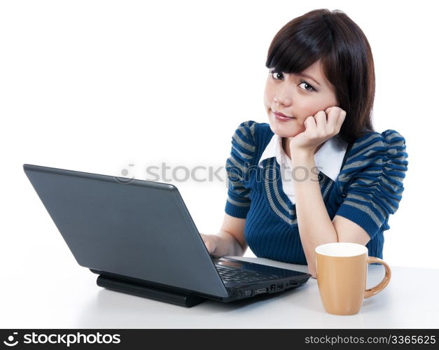 Portrait of a beautiful young female using laptop over white background