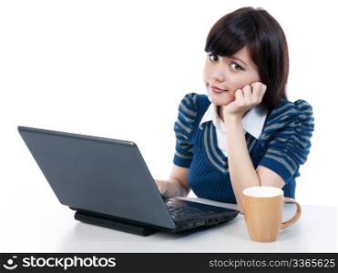 Portrait of a beautiful young female using laptop over white background